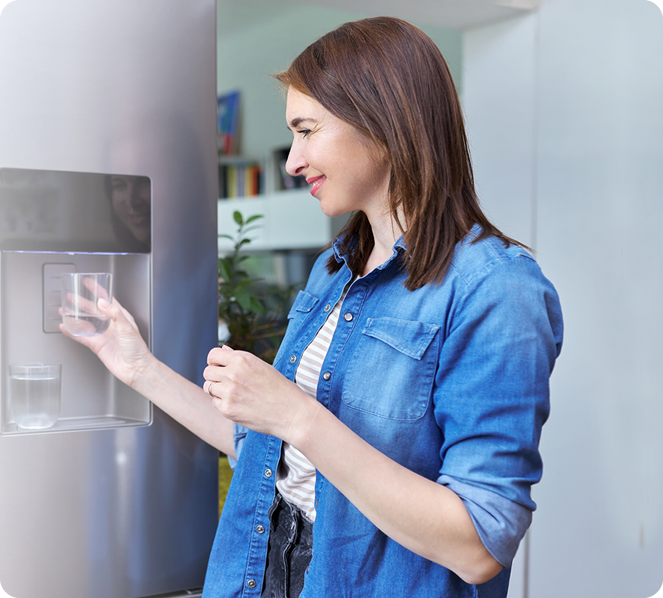 lady-at-drinking-cooler lady using wter machine